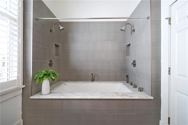 full bath with shower / tub combination