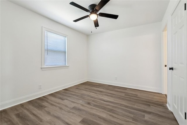 423 Bruce Ave, Terrytown, LA 70056 - unfurnished room with baseboards, dark wood-type flooring, and ceiling fan