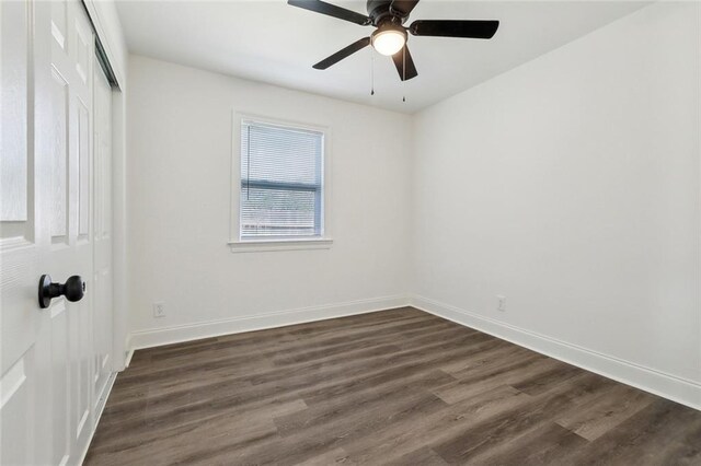 423 Bruce Ave, Terrytown, LA 70056 - unfurnished bedroom featuring a ceiling fan, dark wood-style floors, a closet, and baseboards