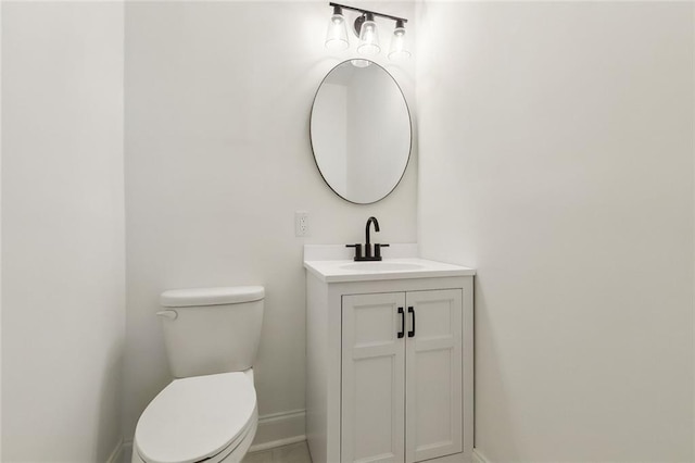423 Bruce Ave, Terrytown, LA 70056 - half bath featuring baseboards, toilet, and vanity