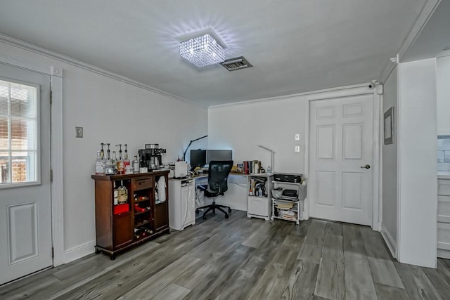 9025 Camille Ct, River Ridge, LA 70123 - home office featuring visible vents, crown molding, baseboards, and wood finished floors