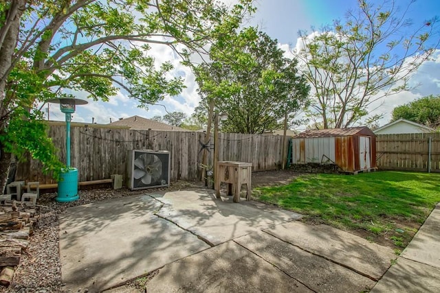 9025 Camille Ct, River Ridge, LA 70123 - view of patio / terrace with a fenced backyard, an outbuilding, and a shed