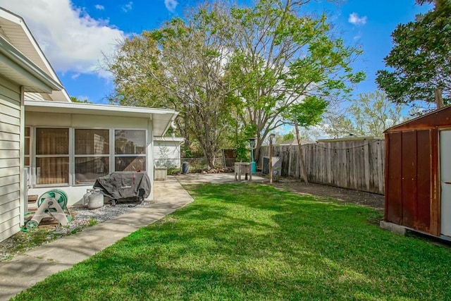 9025 Camille Ct, River Ridge, LA 70123 - view of yard with a sunroom, a fenced backyard, and a patio area