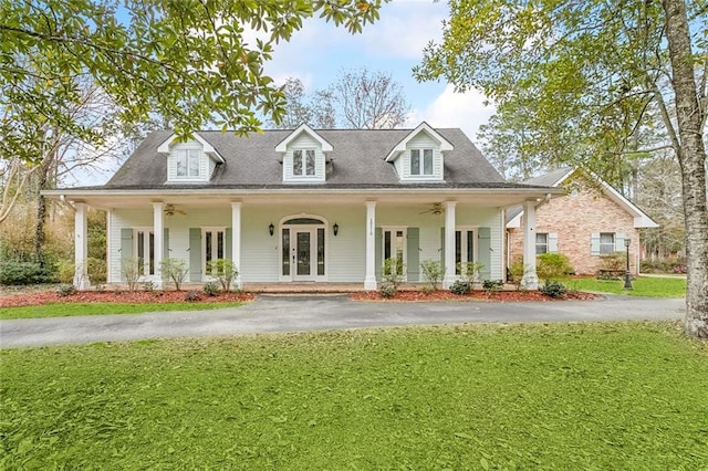 30310 Saint John Dr, Lacombe, LA 70445 - view of front of property with french doors, a front lawn, a ceiling fan, and a porch