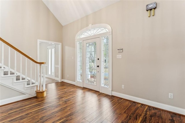30310 Saint John Dr, Lacombe, LA 70445 - entryway featuring wood finished floors, stairs, high vaulted ceiling, and baseboards