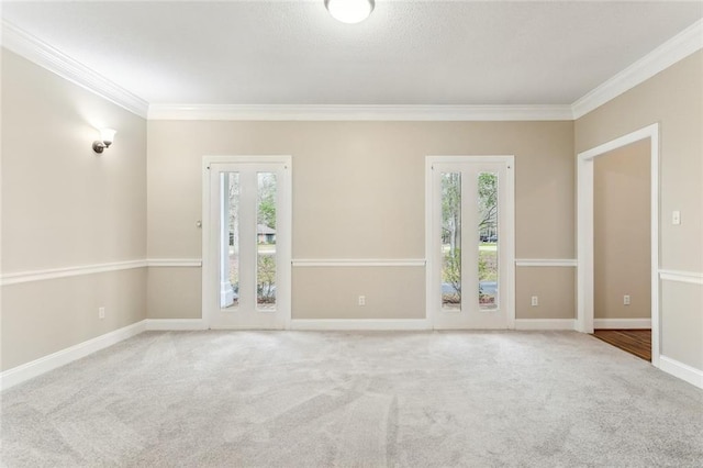 30310 Saint John Dr, Lacombe, LA 70445 - carpeted empty room featuring crown molding, plenty of natural light, and baseboards