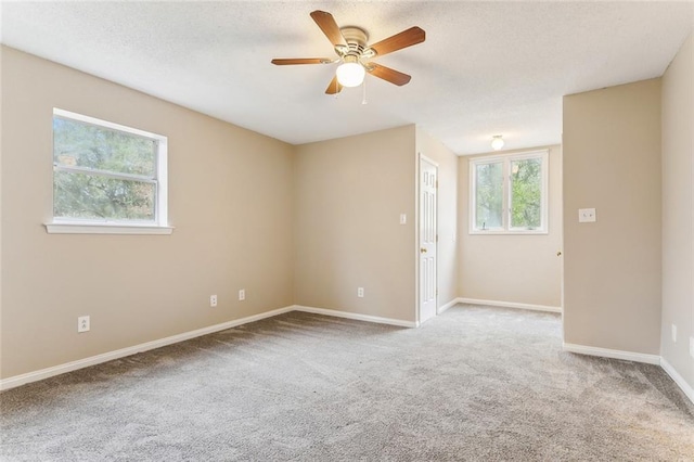 30310 Saint John Dr, Lacombe, LA 70445 - unfurnished room with carpet floors, a ceiling fan, and baseboards