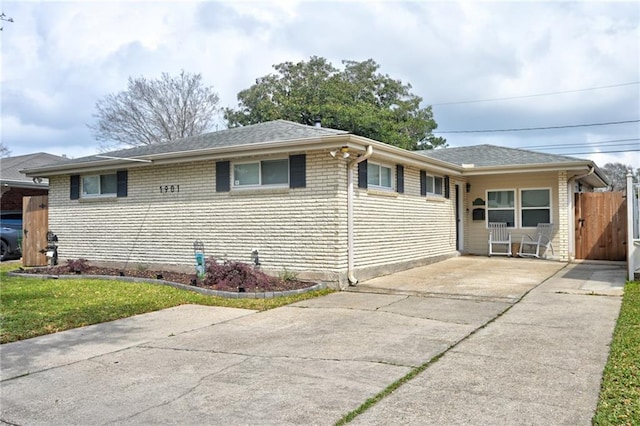 1901 N Turnbull Dr, Metairie, LA 70001 - ranch-style home with driveway and brick siding