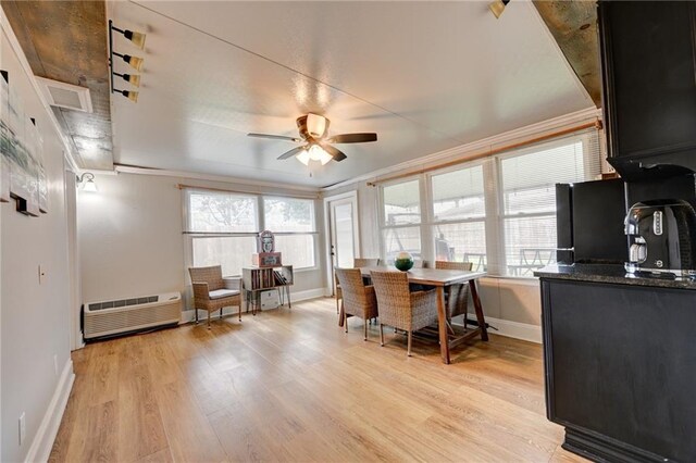 1901 N Turnbull Dr, Metairie, LA 70001 - dining room featuring a ceiling fan, light wood finished floors, plenty of natural light, and ornamental molding