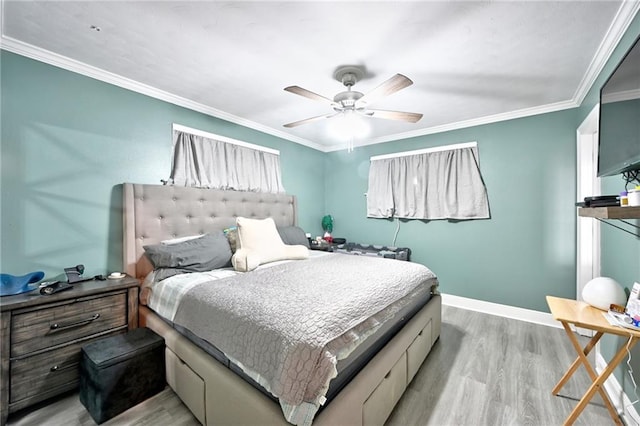 1901 N Turnbull Dr, Metairie, LA 70001 - bedroom featuring light wood-style floors, a ceiling fan, and crown molding