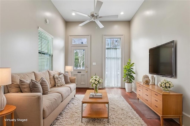 living room with ceiling fan, recessed lighting, and wood finished floors