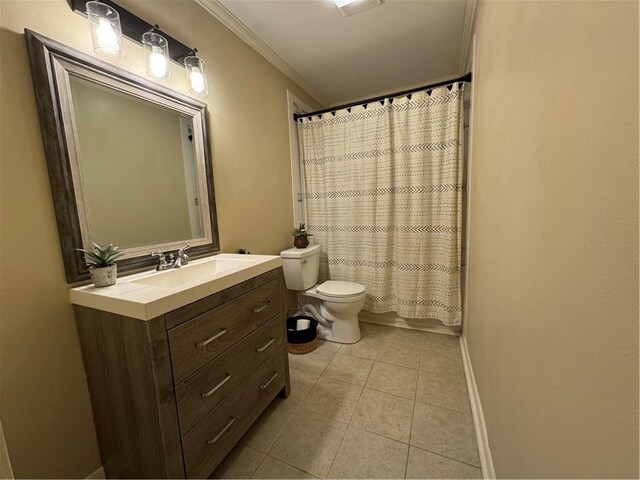 7241 Line Rd, Ethel, LA 70730 - bathroom featuring toilet, ornamental molding, tile patterned flooring, baseboards, and vanity