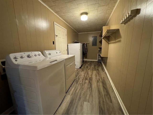 7241 Line Rd, Ethel, LA 70730 - clothes washing area featuring crown molding, washer and clothes dryer, electric panel, laundry area, and wood finished floors