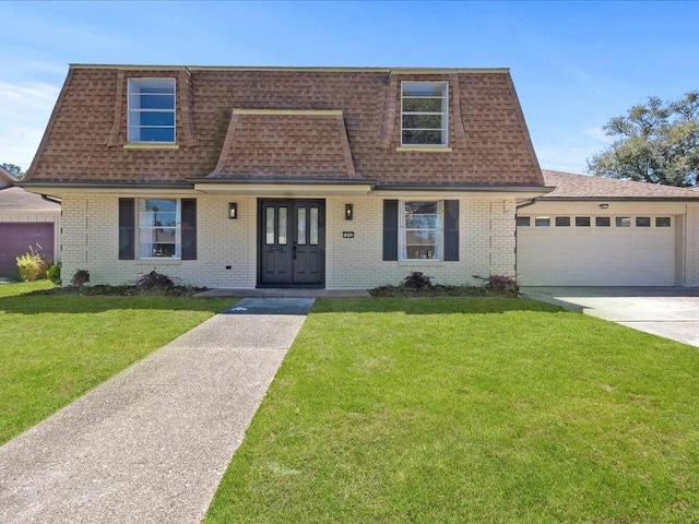1840 Carol Sue Ave, Terrytown, LA 70056 - view of front of property featuring mansard roof, a shingled roof, and a front lawn