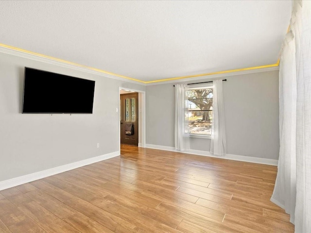 1840 Carol Sue Ave, Terrytown, LA 70056 - empty room with baseboards, light wood finished floors, and ornamental molding