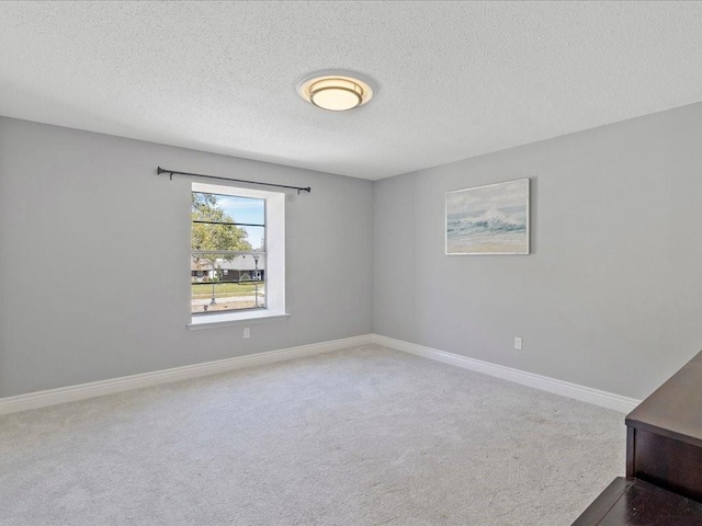 1840 Carol Sue Ave, Terrytown, LA 70056 - carpeted spare room featuring a textured ceiling and baseboards
