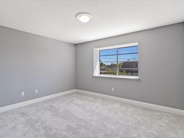 1840 Carol Sue Ave, Terrytown, LA 70056 - carpeted spare room featuring baseboards and a textured ceiling
