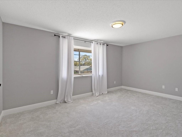1840 Carol Sue Ave, Terrytown, LA 70056 - carpeted spare room with baseboards and a textured ceiling