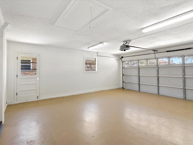 1840 Carol Sue Ave, Terrytown, LA 70056 - garage with baseboards and a garage door opener