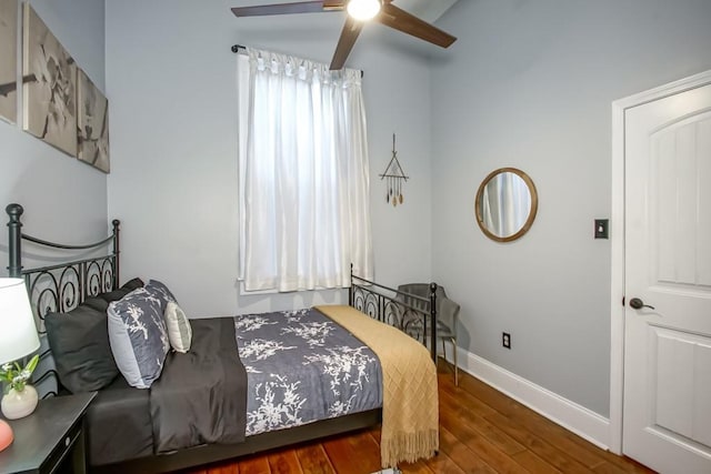 326 N Tonti St, New Orleans, LA 70119 - bedroom featuring wood finished floors and a ceiling fan