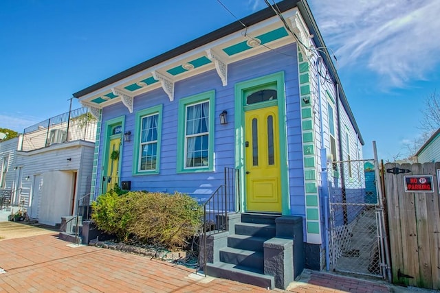 326 N Tonti St, New Orleans, LA 70119 - view of front facade featuring a gate and entry steps