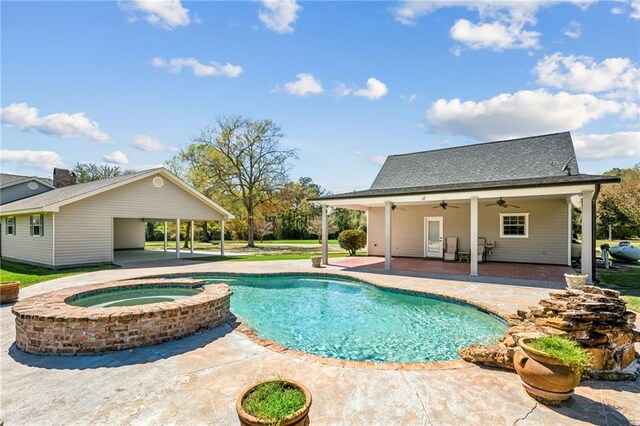 view of swimming pool with a patio, a pool with connected hot tub, and ceiling fan