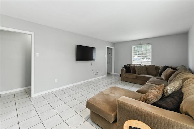 372931 Lilac Ln, Metairie, LA 70001 - living room featuring baseboards and light tile patterned flooring
