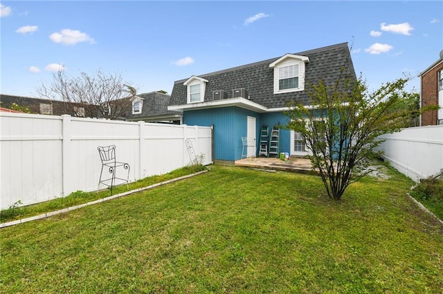 372931 Lilac Ln, Metairie, LA 70001 - exterior space with a yard, a fenced backyard, and a shingled roof