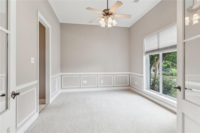 112 Landings Blvd, Slidell, LA 70461 - carpeted spare room with a ceiling fan and a wainscoted wall