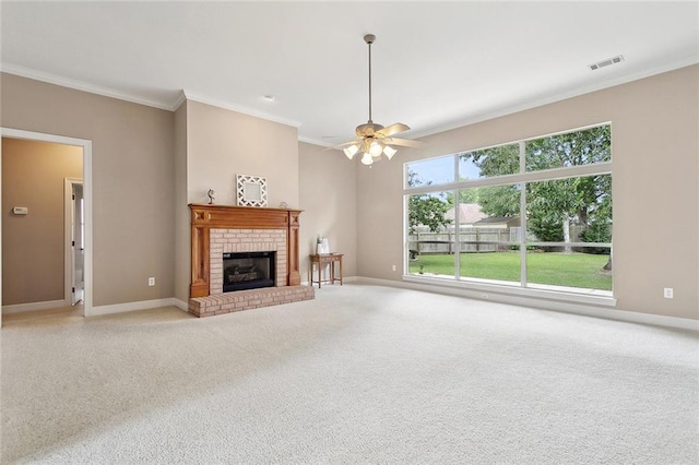 112 Landings Blvd, Slidell, LA 70461 - unfurnished living room with crown molding, baseboards, carpet flooring, and a brick fireplace