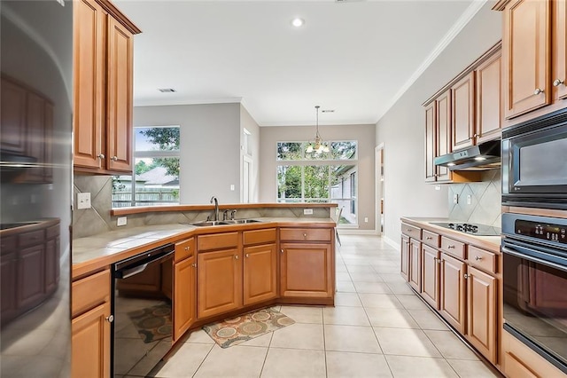 112 Landings Blvd, Slidell, LA 70461 - kitchen featuring black appliances, a sink, ornamental molding, under cabinet range hood, and a peninsula