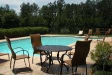 outdoor pool featuring a patio