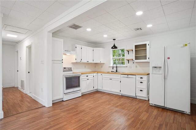 3284 Reine Ave, Slidell, LA 70458 - unfurnished bedroom with multiple windows, baseboards, wood finished floors, and a closet