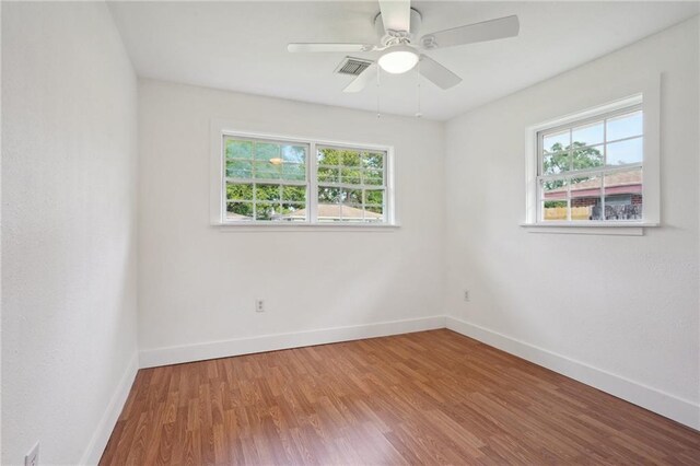 3284 Reine Ave, Slidell, LA 70458 - spare room featuring baseboards, wood finished floors, and ceiling fan
