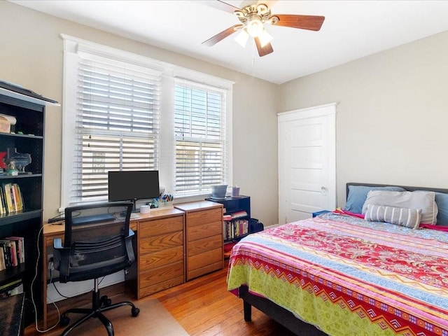 311214 General Taylor St, New Orleans, LA 70125 - bedroom with light wood-type flooring, an office area, and ceiling fan