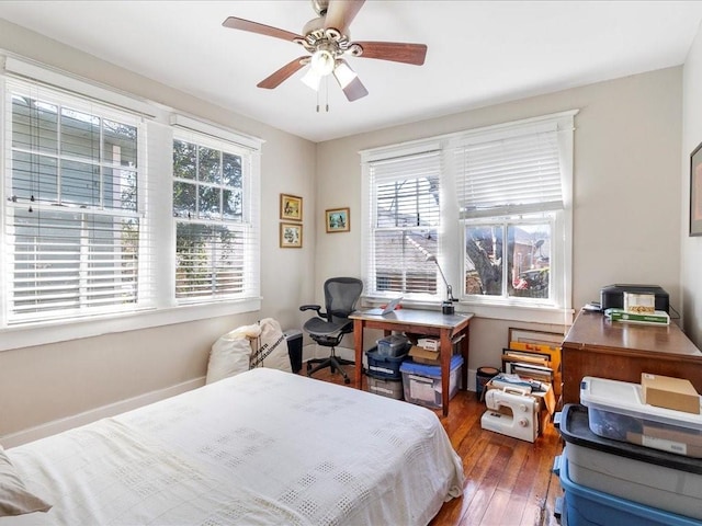 311214 General Taylor St, New Orleans, LA 70125 - bedroom featuring wood-type flooring, a ceiling fan, and an office area