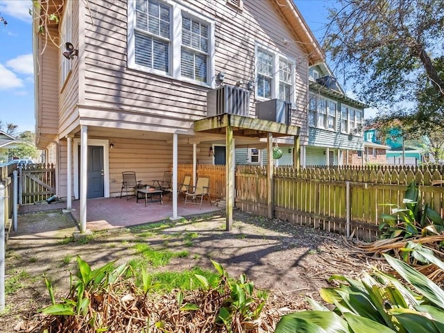 311214 General Taylor St, New Orleans, LA 70125 - rear view of property featuring a patio and a fenced backyard