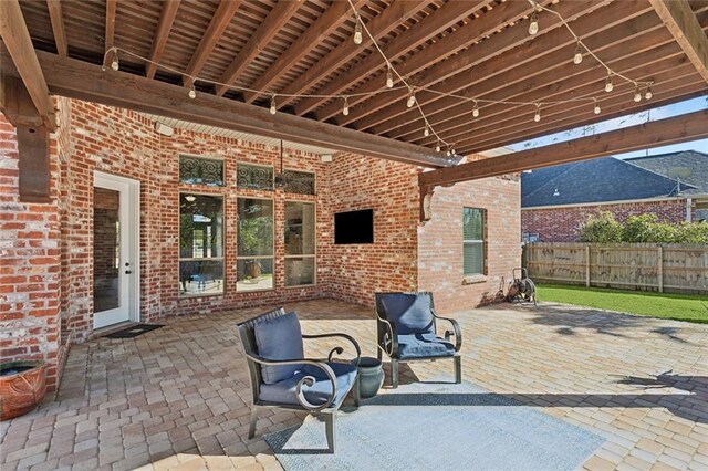 view of patio / terrace with fence