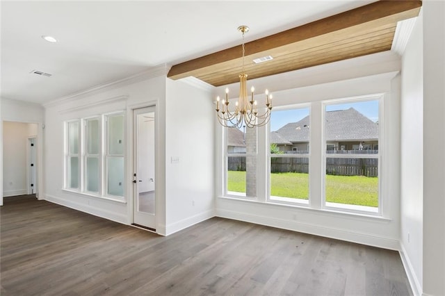 unfurnished dining area featuring a notable chandelier, dark wood-style floors, a healthy amount of sunlight, and visible vents