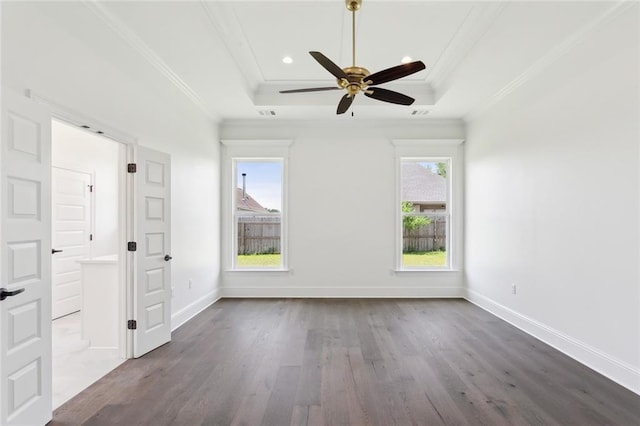 interior space featuring crown molding, multiple windows, and wood finished floors