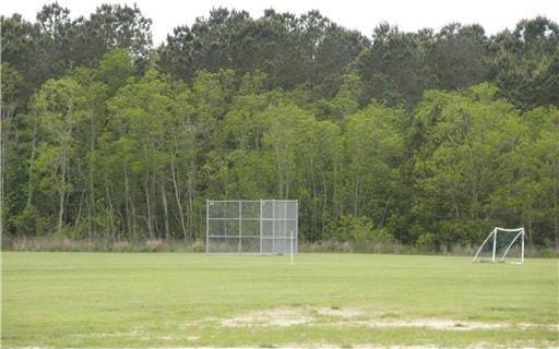 view of yard featuring a view of trees