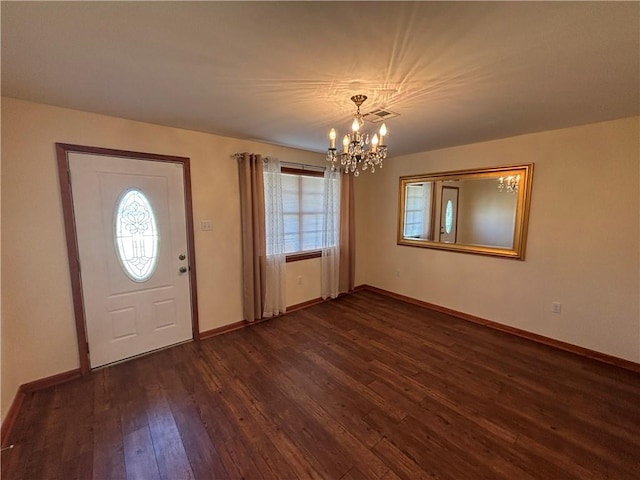 1871 George St, Lutcher, LA 70071 - foyer featuring visible vents, dark wood-style floors, baseboards, and a chandelier
