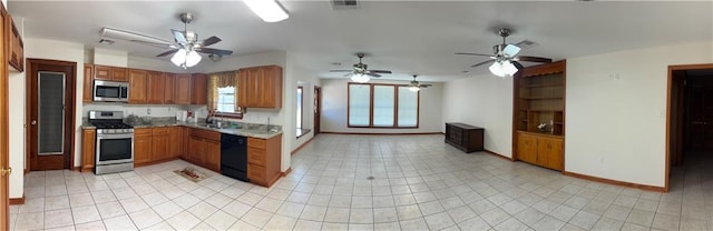 1871 George St, Lutcher, LA 70071 - kitchen with light tile patterned flooring, visible vents, stainless steel appliances, and a ceiling fan