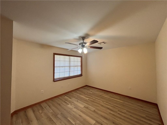 1871 George St, Lutcher, LA 70071 - unfurnished room featuring baseboards, visible vents, a ceiling fan, and light wood-style floors