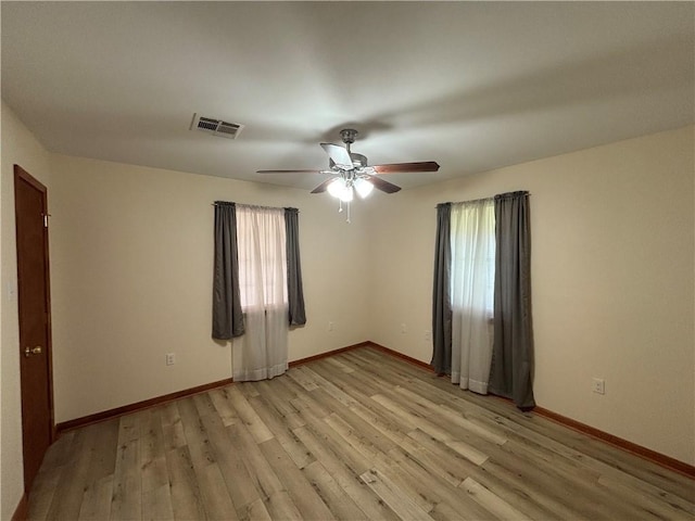 1871 George St, Lutcher, LA 70071 - empty room featuring ceiling fan, visible vents, plenty of natural light, and light wood-style flooring