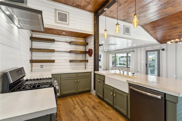1612 Mossy St, Covington, LA 70433 - kitchen with open shelves, visible vents, green cabinetry, and stainless steel appliances