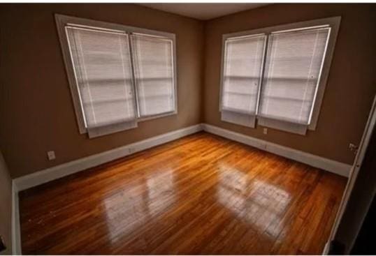 1612 Mossy St, Covington, LA 70433 - unfurnished room featuring baseboards and wood finished floors