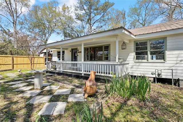 1612 Mossy St, Covington, LA 70433 - exterior space with a porch and fence