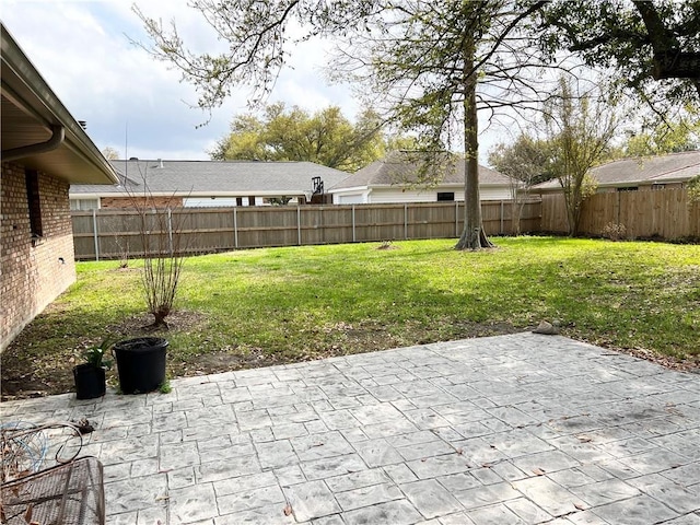 137 Nolan Dr, La Place, LA 70068 - view of yard featuring a patio area and a fenced backyard