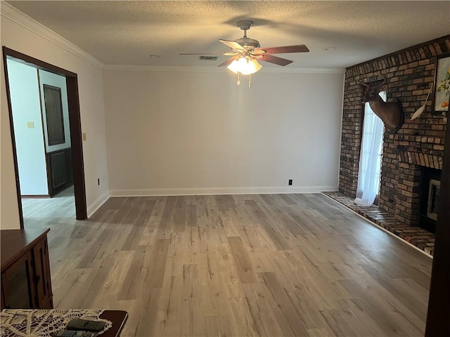 137 Nolan Dr, La Place, LA 70068 - unfurnished living room with light wood-style flooring, ceiling fan, ornamental molding, and visible vents